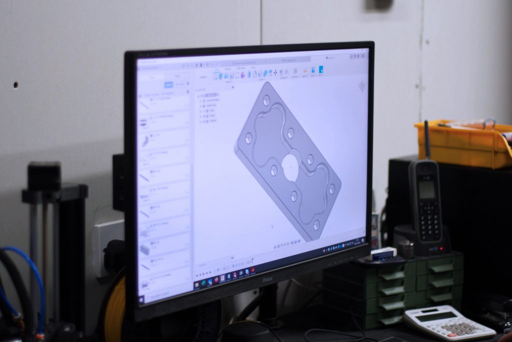 Computer monitor with the program Fusion 360 CAD running